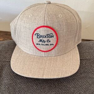 Brixton Light Tan Cap with Red Emblem